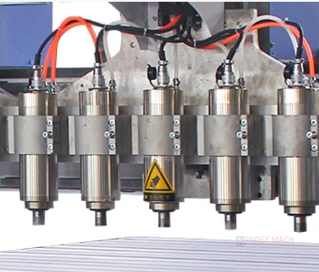Multi-spindle CNC wood router spindle unit — five matched spindles on one gantry carriage for identical parts in one pass