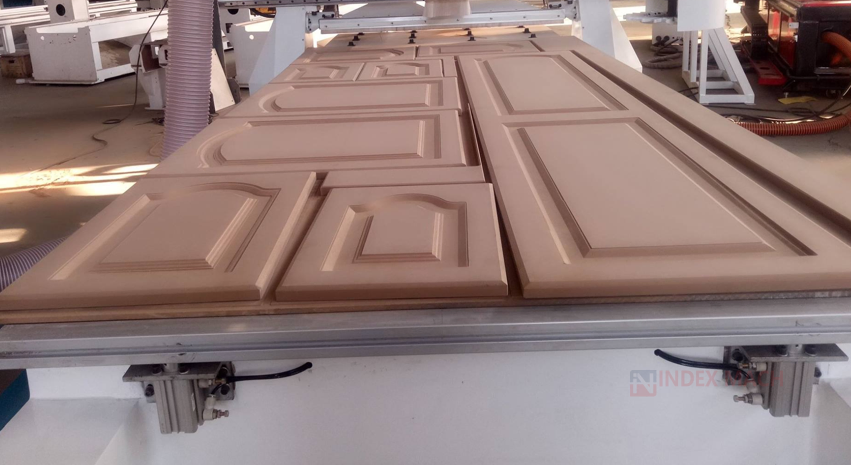 ATC CNC router machining thermofoil cabinet doors with automatic tool change